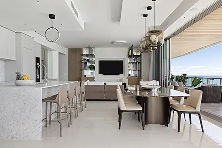 Dining Room and Kitchen Open Space in a Miami Beach Condo Designed by DKOR Interiors