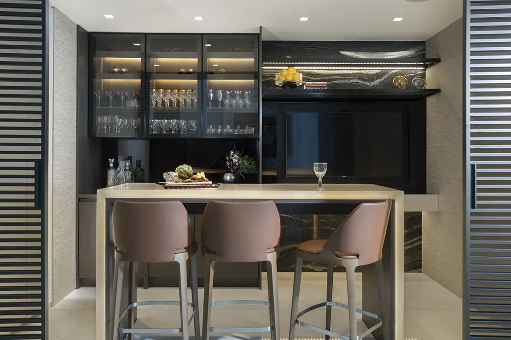 Elegant Custom Home Bar Design with Sliding Doors