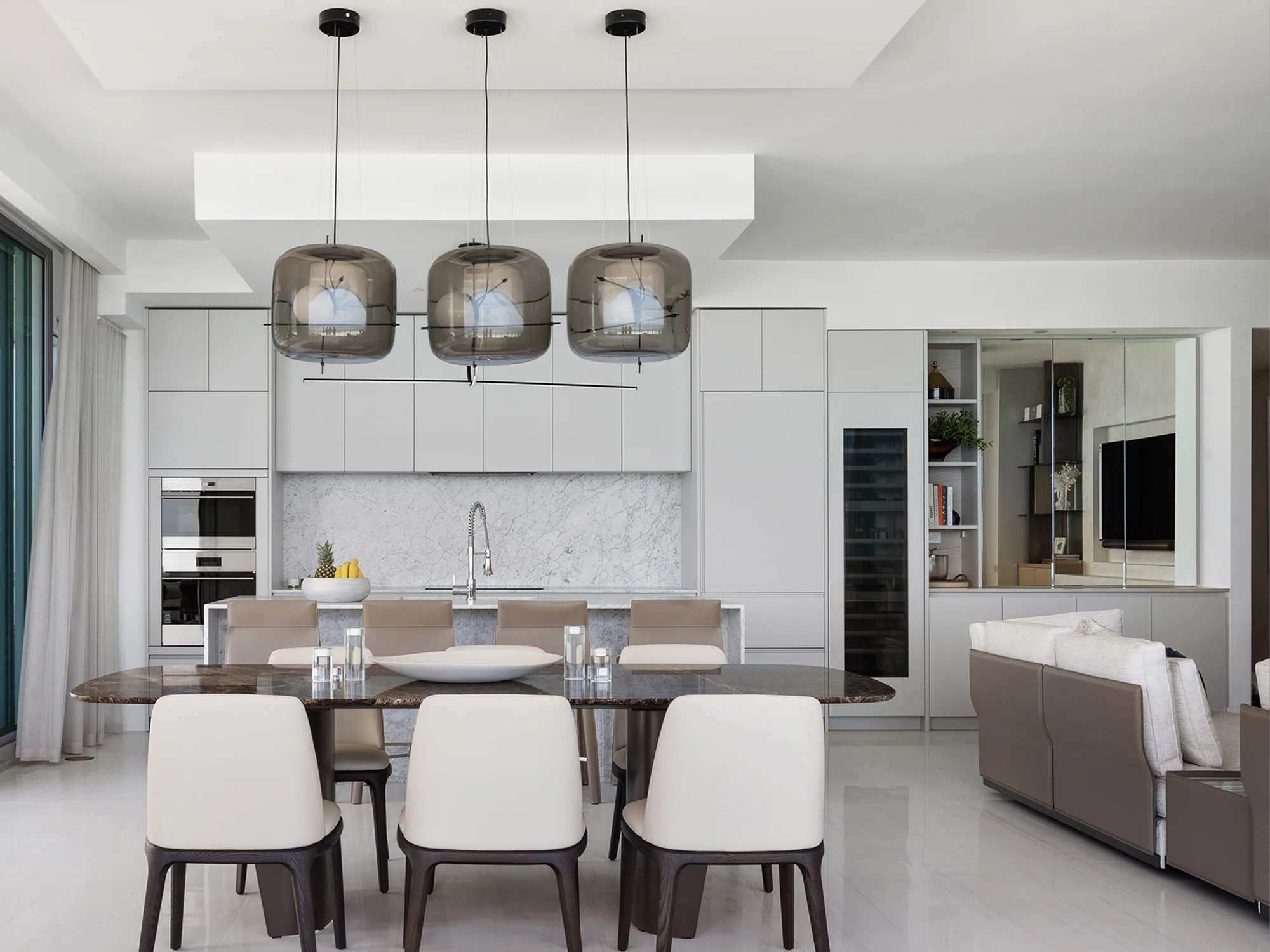Kitchen and Dining Room Areas in an Open Floor Plan in a Miami Condo