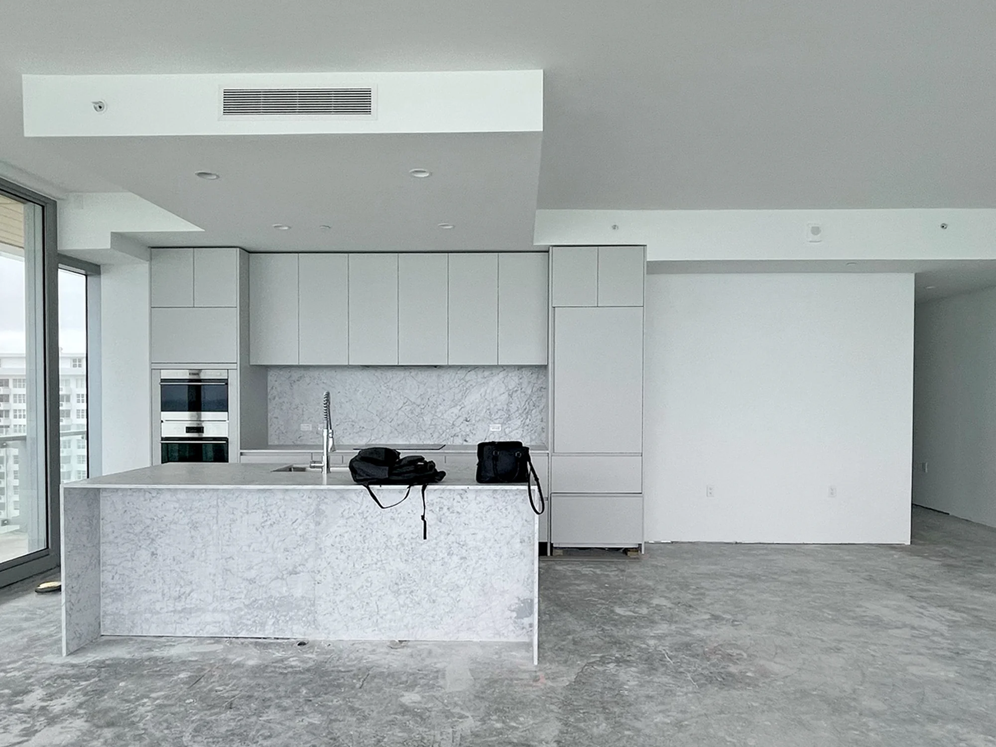 Miami Condo Kitchen Existing Conditions Before Interior Designs by DKOR Interiors