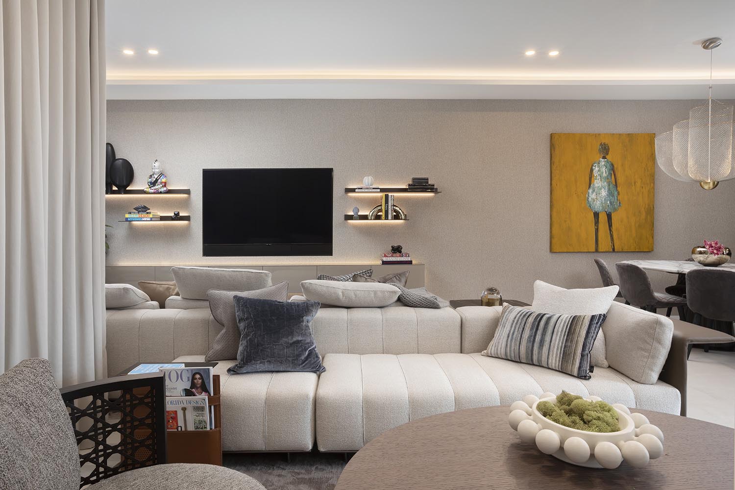 living room, monotone, modern couch, tv room, bright painting, sophisticated, offwhite