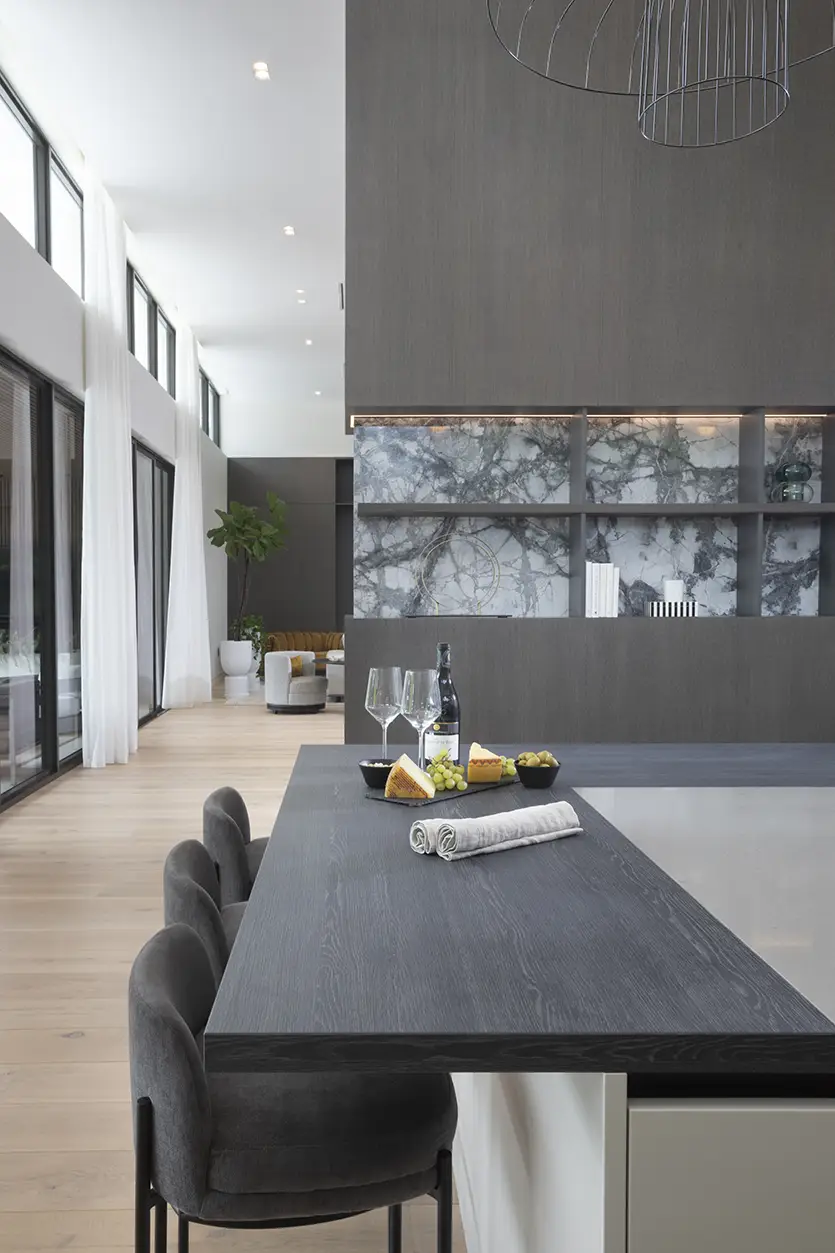 Kitchen view the living room of a Zen Contemporary Miami Residence.