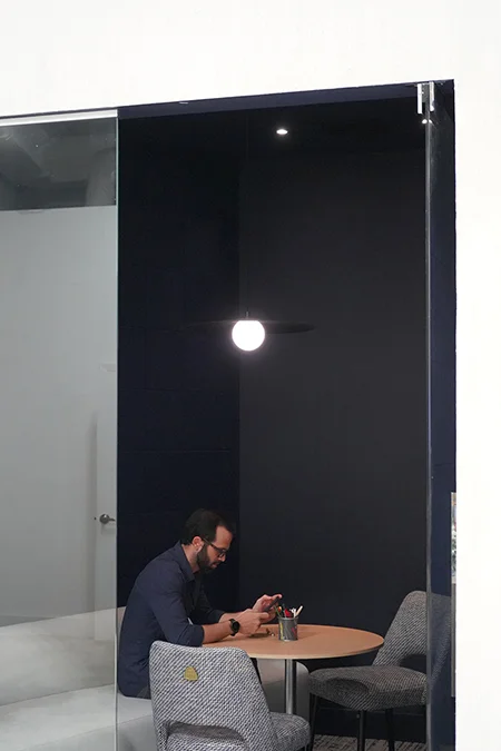 Blue room phone booth for a creative studio