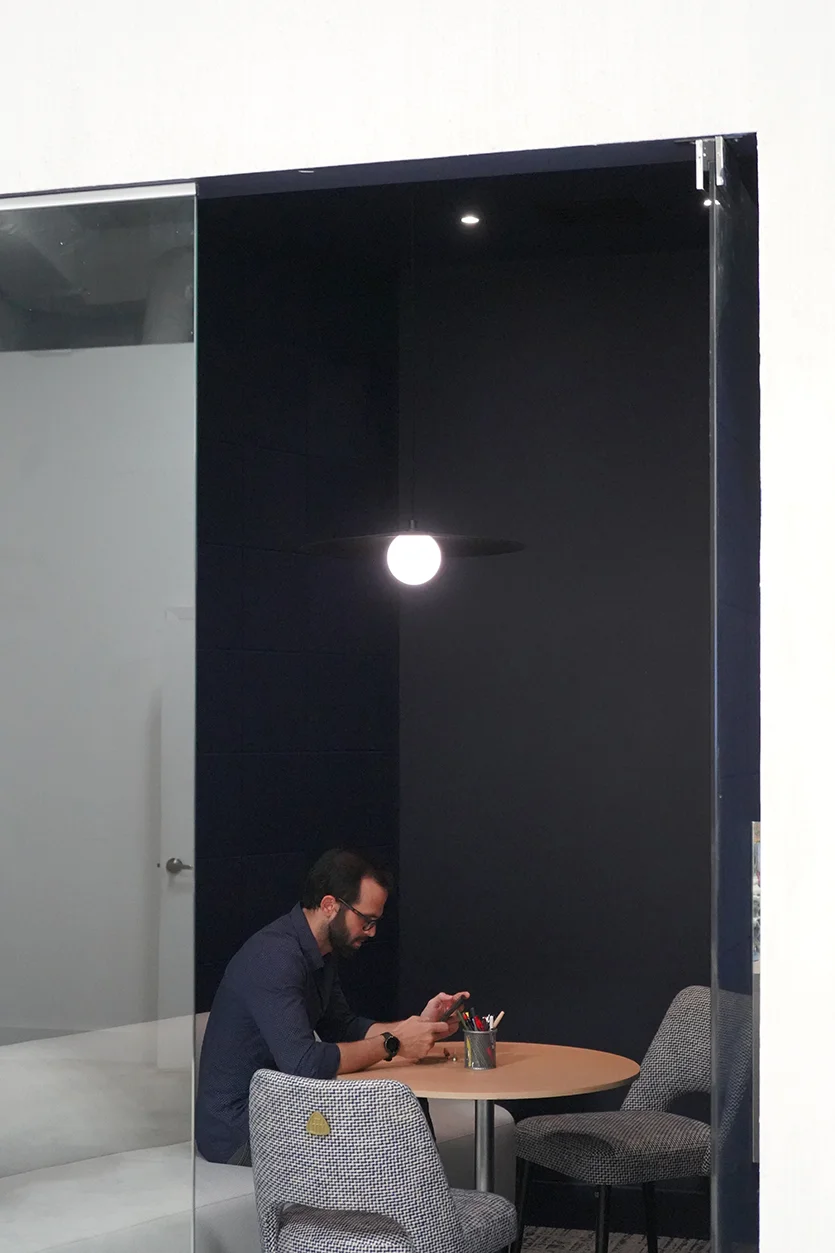 Blue room phone booth for a creative studio