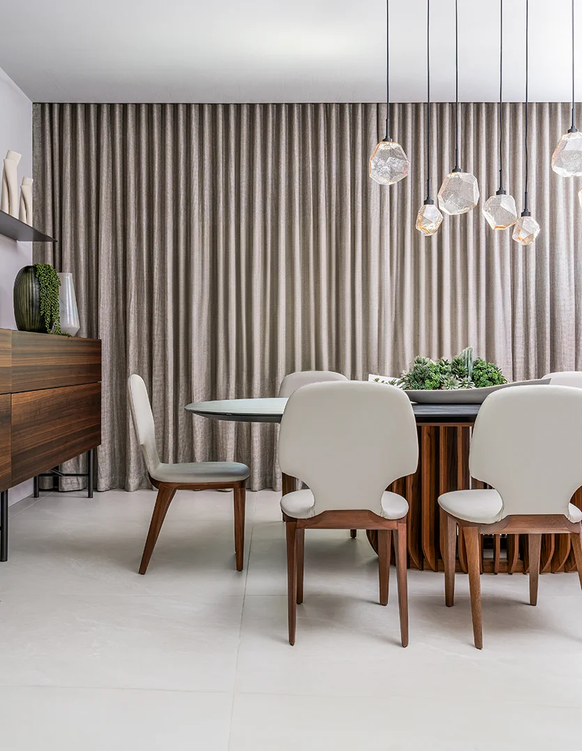 Dining room design of Bay Harbor Island home in Miami after renovation by DKOR Interiors.