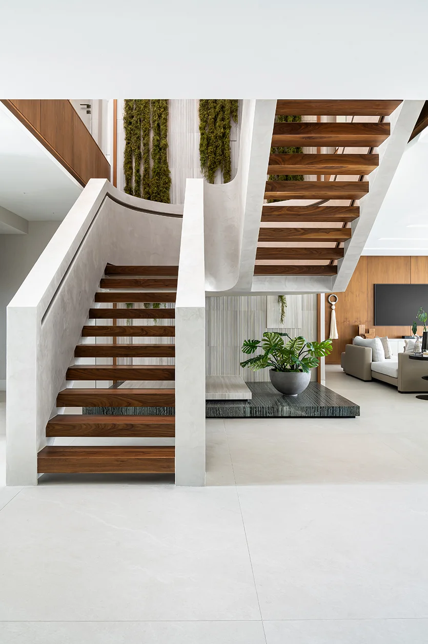 Staircase design of Bay Harbor Island home in Miami after renovation by DKOR Interiors.