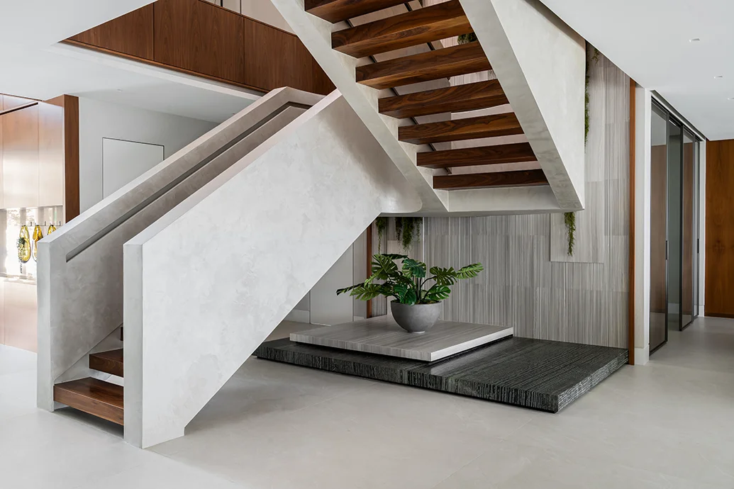 Staircase design of Bay Harbor Island home in Miami after renovation by DKOR Interiors.