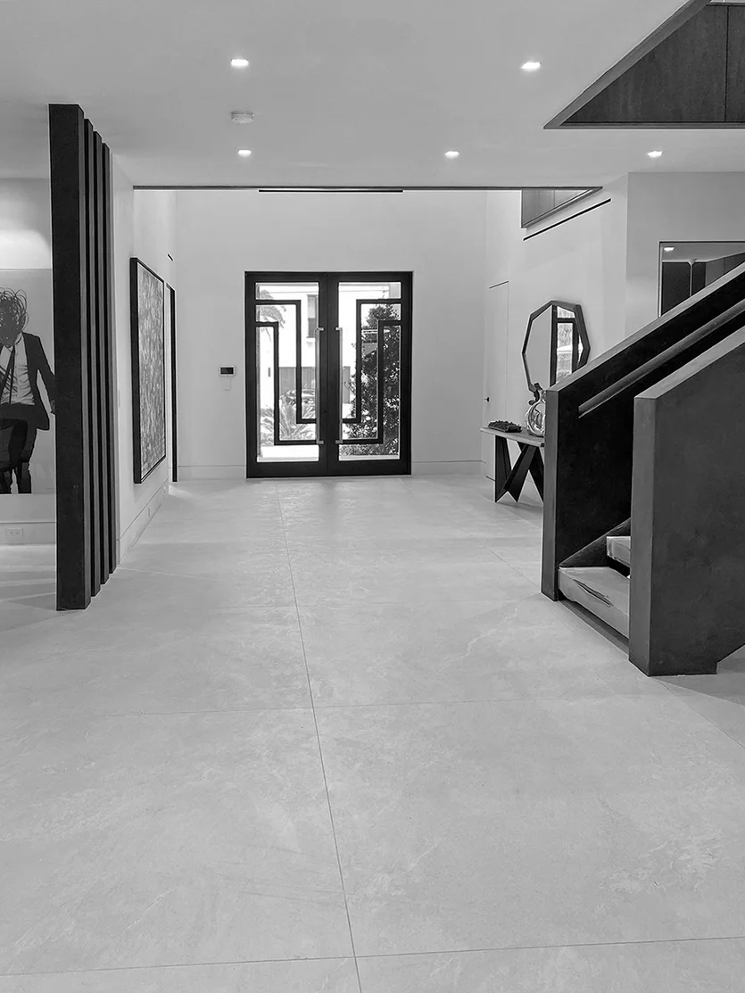 Existing conditions of foyer spaces of a home in Bay Harbor Island