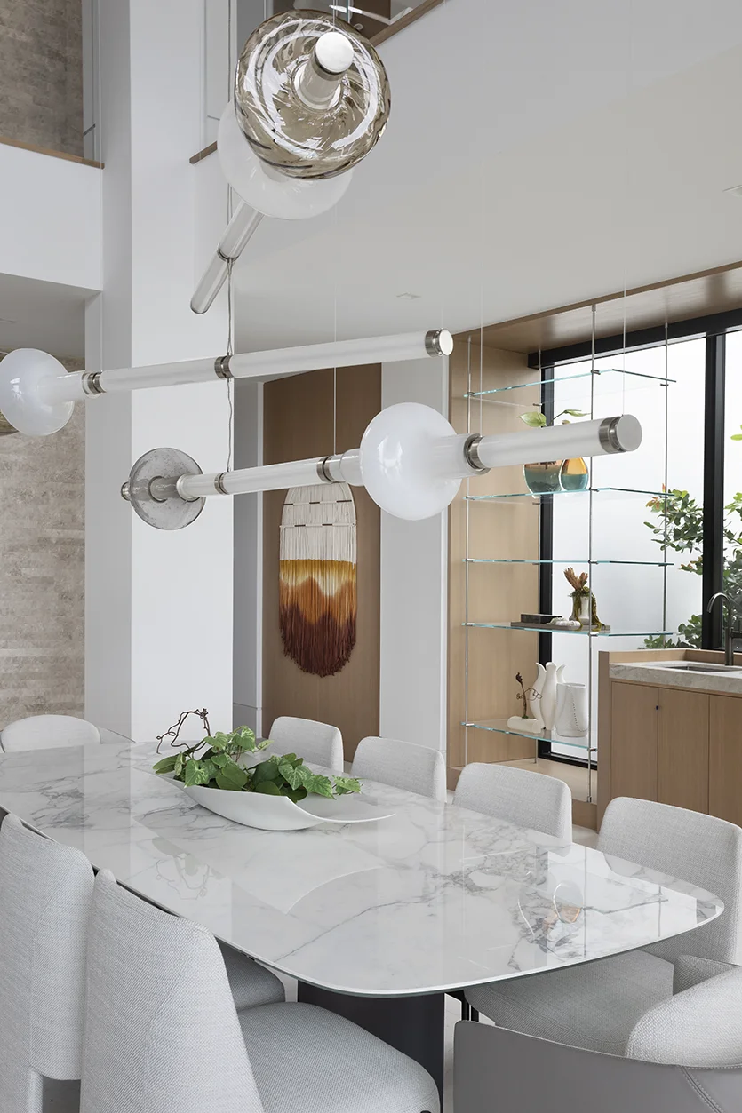 Hillsboro Beach oceanfront home dining room designed by Miami residential designers