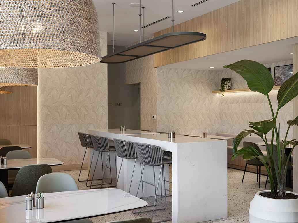 Contemporary restaurant interior design in Fort Lauderdale with bar seating, woven pendant lights, tropical plants, and light wood accents