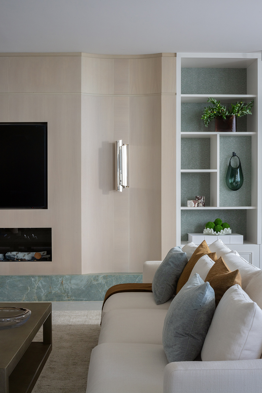 Composite view of custom bathroom vanity and bedroom paneling in a Miami luxury condo.