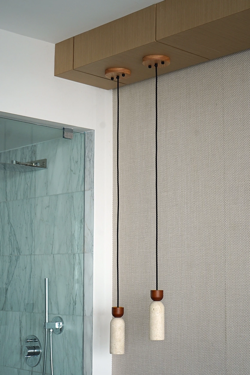 Textured wallpaper connecting bedroom and open concept bathroom design, Miami interior designers