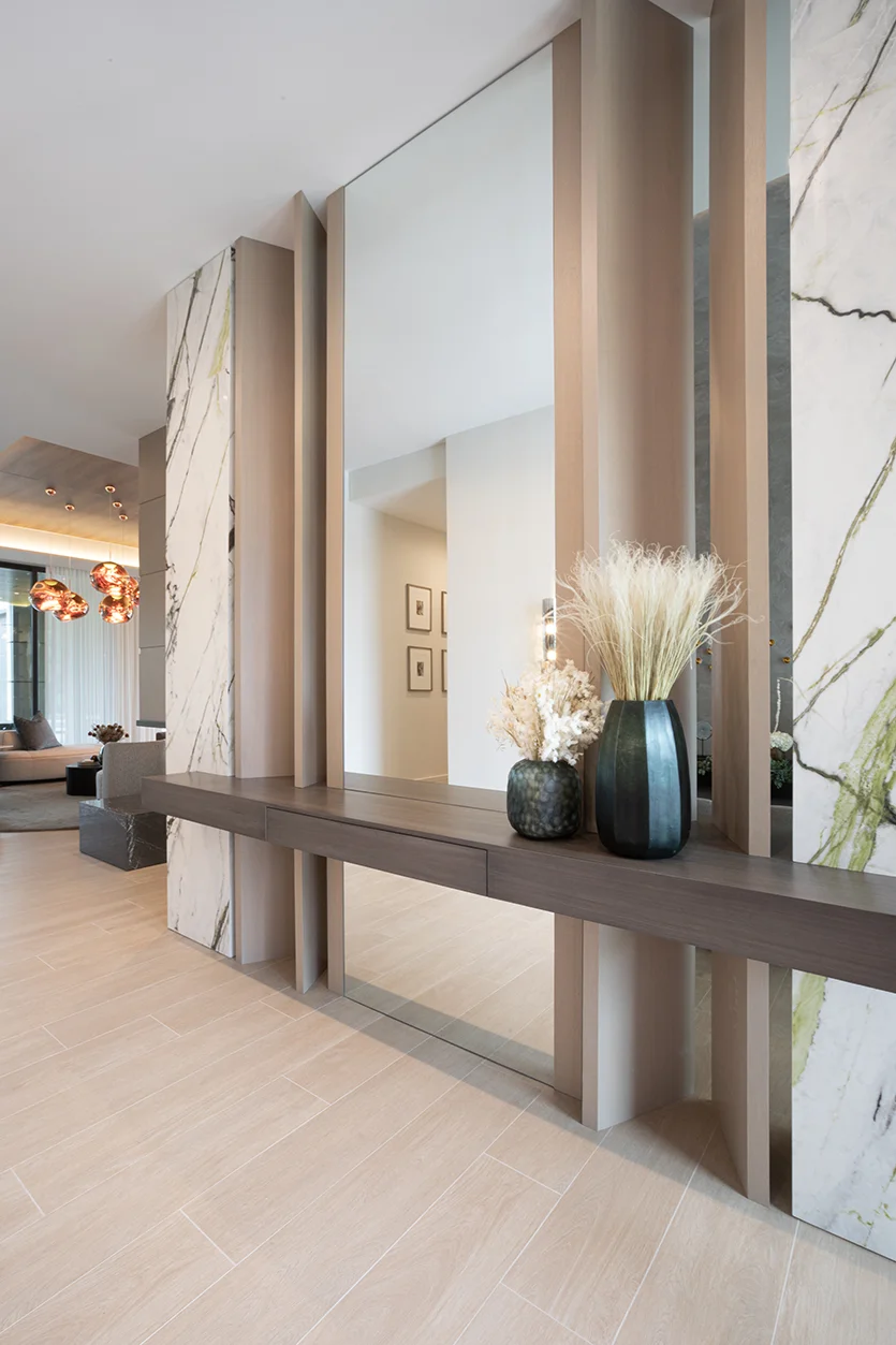 Custom-built entry console in a Palm Beach Gardens home foyer