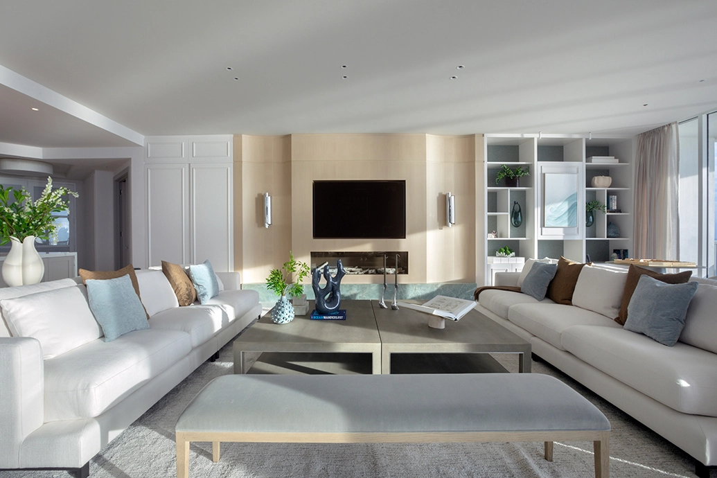 Existing kitchen with walnut cabinetry and dark marble connected to the bar and dining area, Miami Beach interior design